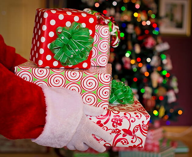 Santa Holding Holiday Presents