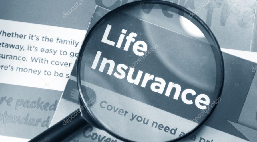 Magnifying Glass On Life Insurance Book